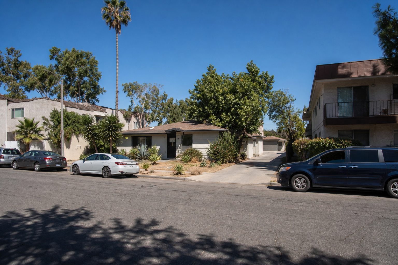 Multi-unit property with ADU structure visible in Reseda Boulevard residential area near CSUN campus, Northridge.