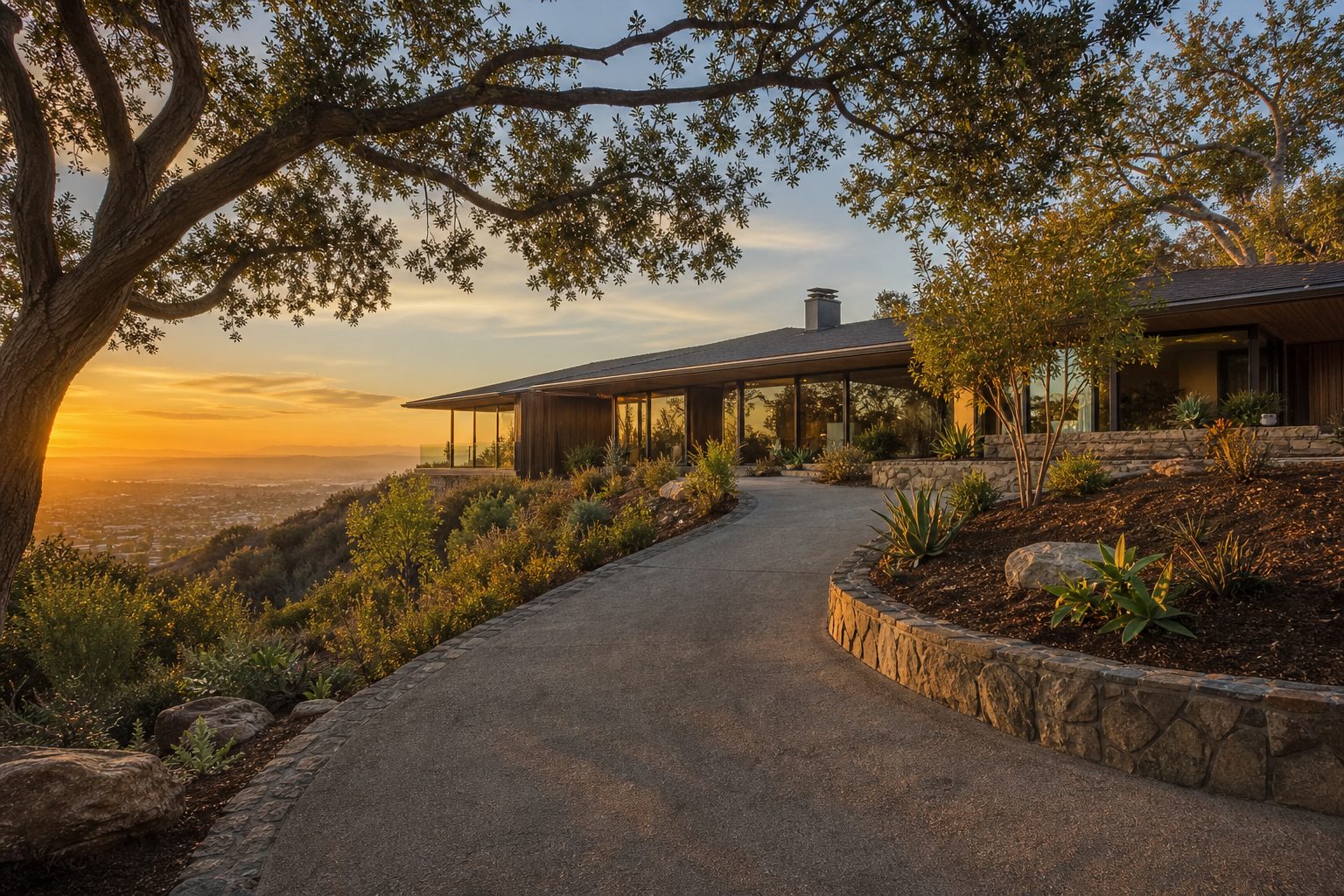 Hillside Woodland Hills home with fire-hardened architecture and defensible space clearing in the Santa Monica Mountains foothills.