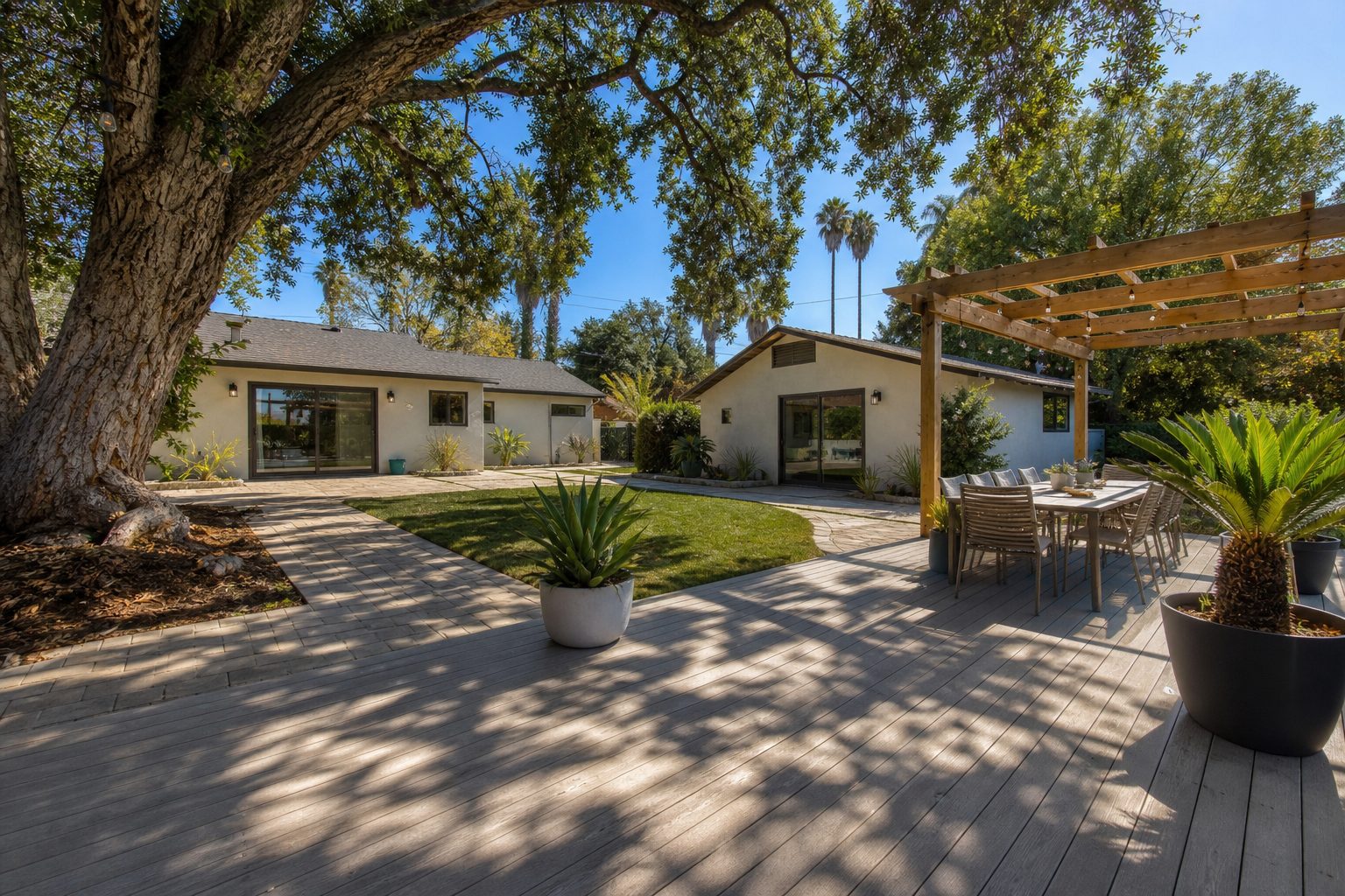 Ranch home with shaded patio, pergola, and backyard seating in Lake Balboa