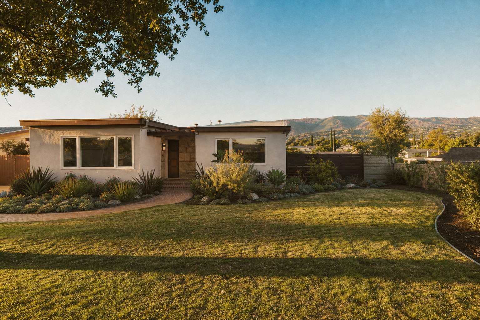 Single story ranch home with a large front lawn in Lake Balboa