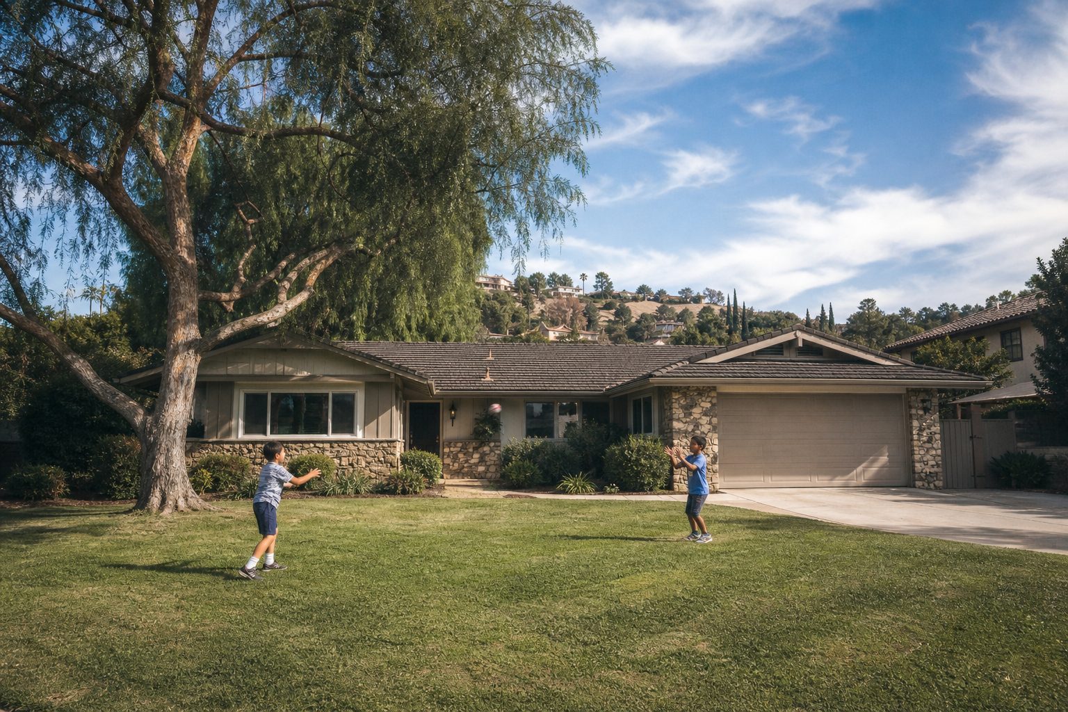 Ranch-style Northridge family home with pepper tree, front lawn, and children playing in yard during midday.